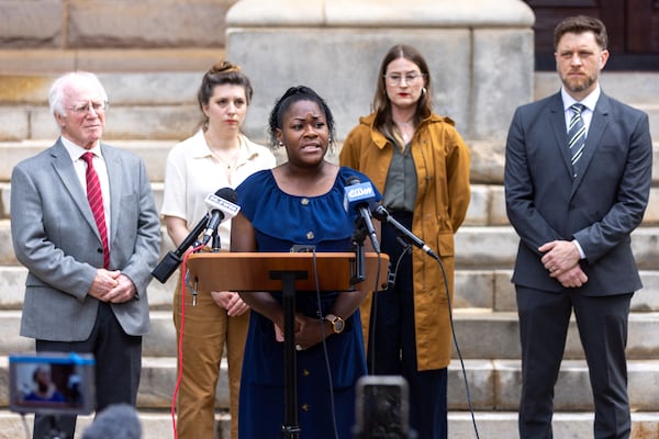 Plaintiff Keyanna Jones speaks at a press conference in Decatur on Monday, July 10, 2023. Four residents of unincorporated DeKalb County are suing the city of Atlanta and the state of Georgia to be able to collect signatures in the effort to get the public safety training center on the ballot as a referendum. (Arvin Temkar / arvin.temkar@ajc.com)