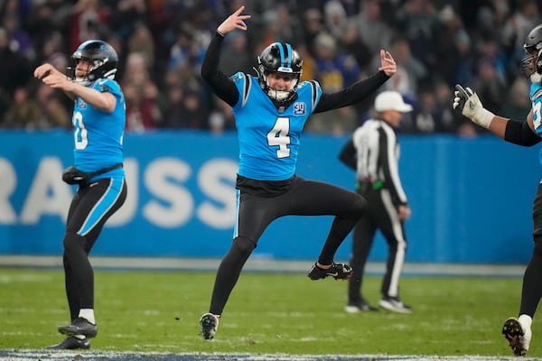 Carolina Panthers kicker Eddy Pineiro celebrates after kicking the game-winning field goal in overtime against New York Giants during an NFL football game, Sunday, Nov. 10, 2024, in Munich, Germany. (AP Photo/Matthias Schrader)