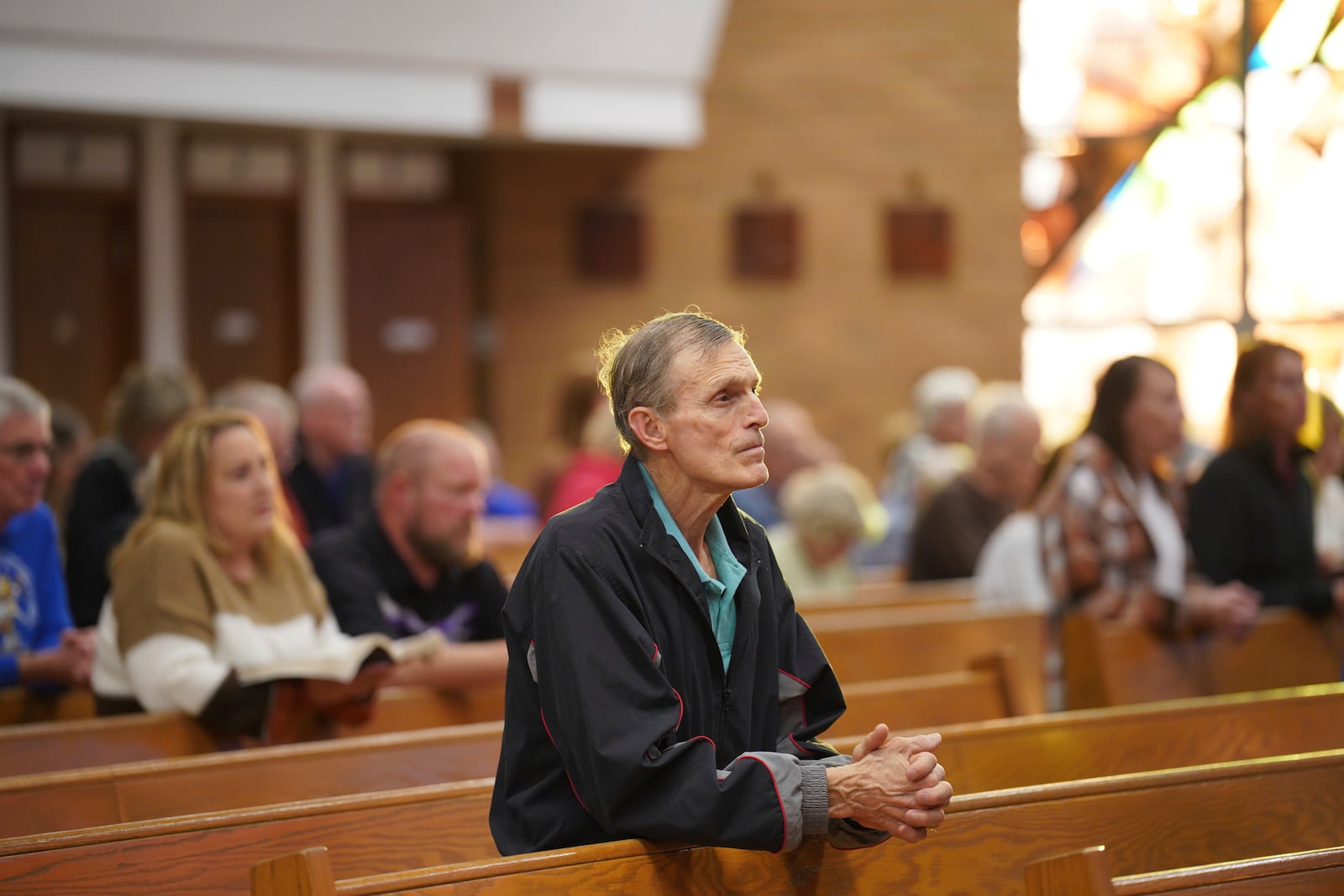 Congregants attend the English-language Mass at St. Mary’s Catholic Church on Saturday, Oct. 19, 2024, in Worthington, Minn. (AP Photo/Jessie Wardarski)