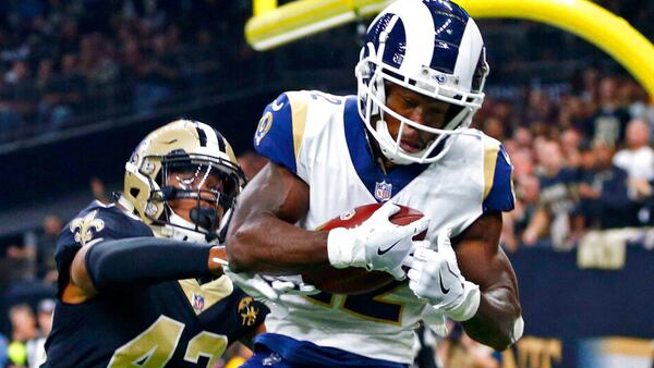 FILE - In this Nov. 4, 2018, file photo, Los Angeles Rams wide receiver Brandin Cooks (12) pulls in a touchdown reception in front of New Orleans Saints free safety Marcus Williams (43) in the first half of an NFL football game in New Orleans. Cooks is the first player in NFL history to have three consecutive 1,000-yard receiving seasons with three different teams.