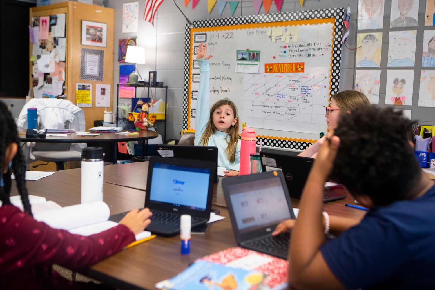 Penny Davis raises her hand during class on Wednesday, November 16, 2022, at Hickory Hills Elementary School in Marietta, Georgia. Marietta City Schools, like schools across the country, are working to overcome learning loss caused by the pandemic. CHRISTINA MATACOTTA FOR THE ATLANTA JOURNAL-CONSTITUTION