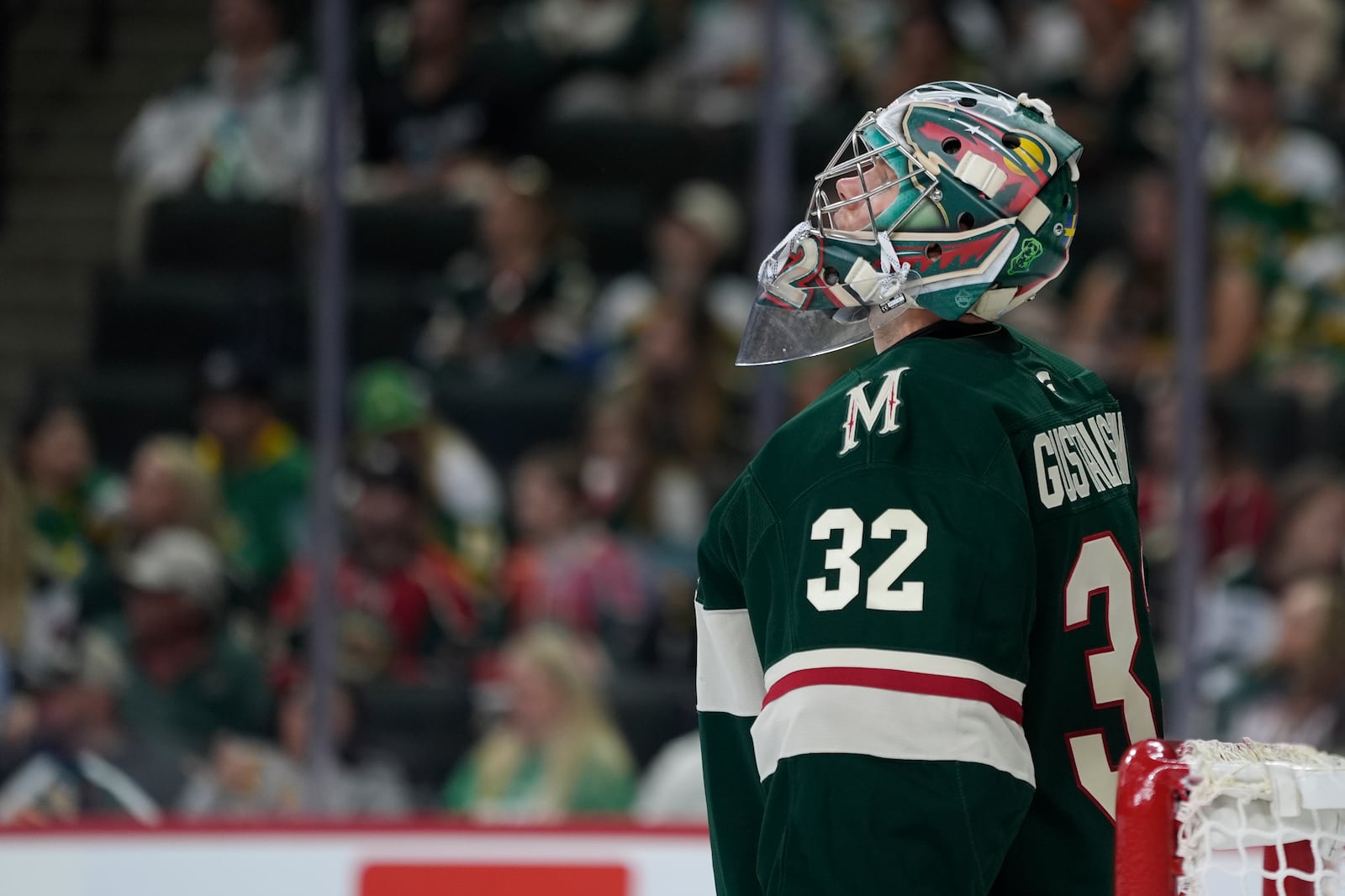 Minnesota Wild goaltender Filip Gustavsson (32) looks at the videoboard after a goal by Columbus Blue Jackets center Kent Johnson (91) during the second period of an NHL hockey game, Thursday, Oct. 10, 2024, in St. Paul, Minn. (AP Photo/Abbie Parr)