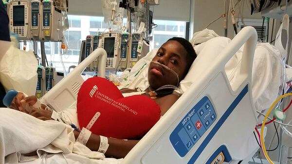 Amari Hall, 15, is pictured recovering from his March 2017 heart transplant at the University of Maryland Children's Hospital. Amari was born with hypoplastic left heart syndrome, a congenital heart defect that occurs when the left side of a person's heart is underdeveloped. (Save the Heartbeat)