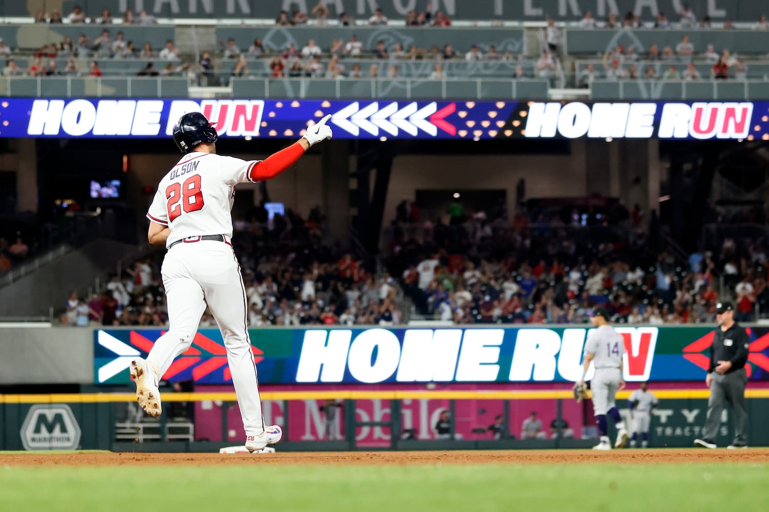 Braves first baseman Matt Olson (28) rounds first base after hitting a solo home run during the bottom of the seventh inning at Truist Park against the Colorado Rockies on Thursday, June 15, 2023, in Atlanta. Miguel Martinez / miguel.martinezjimenez@ajc.com 