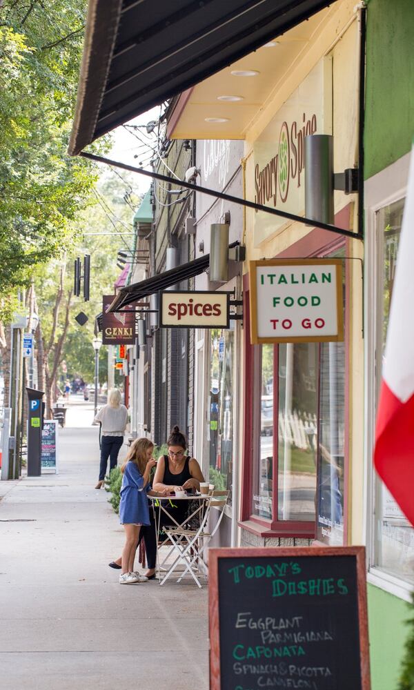 Virginia Highland’s N. Highland Ave. runs past restaurants, retail, private homes, apartments and a fire station. (Jenni Girtman/Atlanta Event Photography)