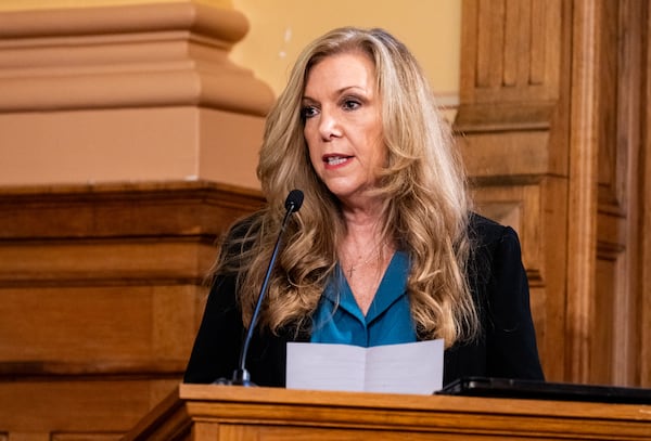 Julie Adams, a member of the Fulton County Board of Elections, presents a petition to expand the access of poll watchers during a State Election Board meeting at the Georgia State Capitol in Atlanta on Tuesday, Aug. 6, 2024. (Seeger Gray/AJC)