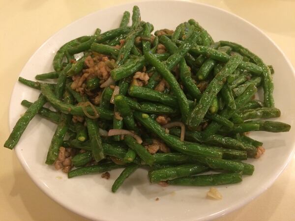 The wok-fired green beans with minced pork are a good choice from the a la carte menu at Won Won Seafood House in Duluth. CONTRIBUTED BY WENDELL BROCK