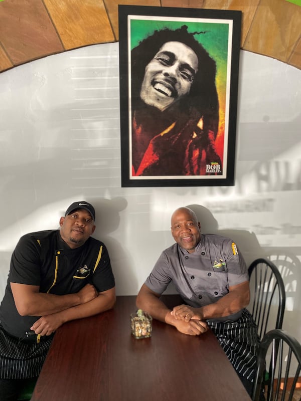 Alrick and Desrick Smith, brothers who grew up together in Jamaica and went their separate ways, have reunited to open Spicy Hill restaurant in Jonesboro. Wendell Brock for The Atlanta Journal-Constitution