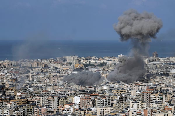 Smoke rises after an Israeli airstrike on Dahiyeh, in the southern suburb of Beirut, Lebanon, Saturday, Nov. 16, 2024. (AP Photo/Bilal Hussein)