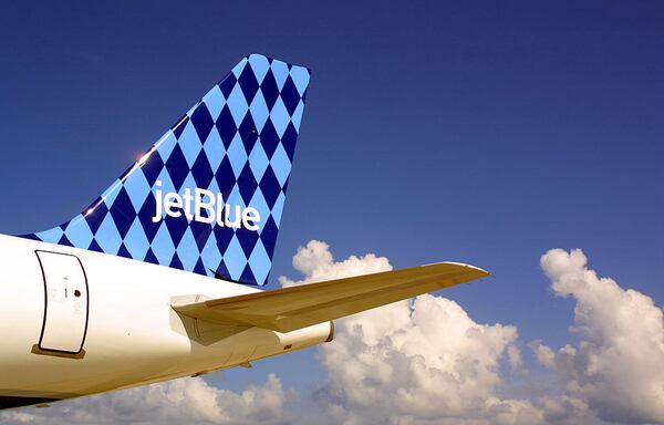 FILE PHOTO: A JetBlue Airways jet sits on a tarmac.