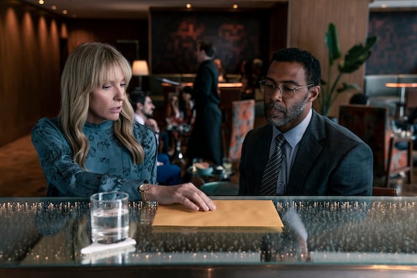 Toni Collette as Laura Oliver and Omari Hardwick as Gordon Oliver in "Pieces of Her." Courtesy of Mark Rogers/Netflix © 2022