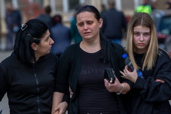 Relatives of victims leave a hospital in the town of Kocani, North Macedonia, Monday, March 17, 2025, following a massive fire in the nightclub early Sunday. (AP Photo/Visar Kryeziu)