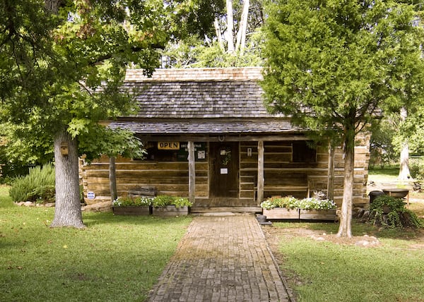 Uncle Remus Museum: This cabin in Eatonton is dedicated to the memory and work of town son Joel Chandler Harris. His tales of Br’er Rabbit originated in Africa. They were originally told on plantations by slaves. The museum is made of portions of at least two slave cabins. (Courtesy of the Uncle Remus Museum)