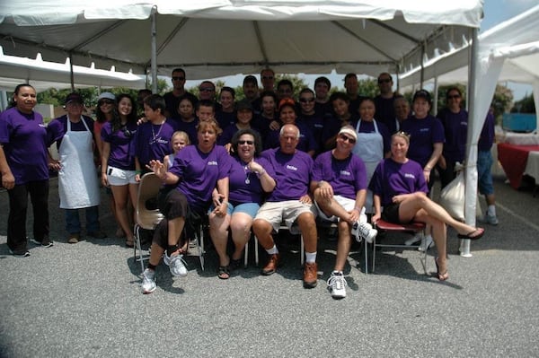 The Casa Nuova staff gathers for Purple Pansies Customer Appreciation Day in 2010. Courtesy of Casa Nuova Italian Restaurant