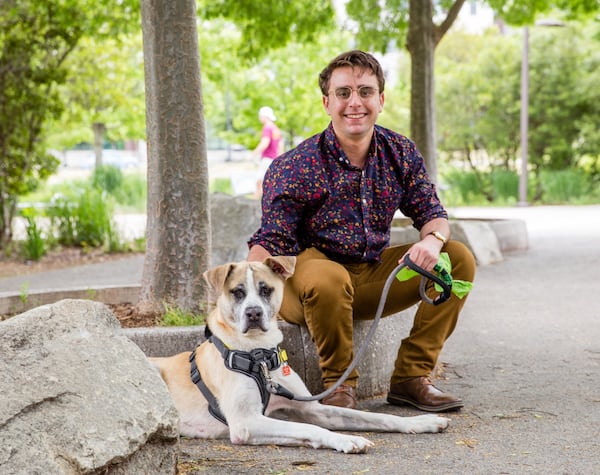 Stanford Leach fosters Rudy, a dog from LifeLine Animal Project in Fulton County. (Jenni Girtman for Atlanta Journal-Constitution)