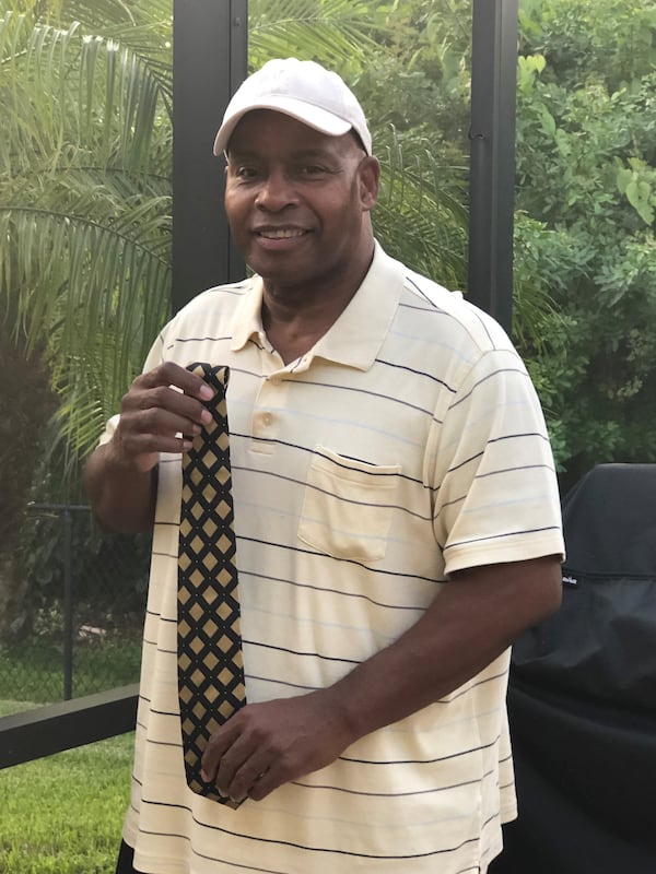 The Rev. Barrion J. Staples, holding his C.T. Vivian tie, says Vivian was a mentor to him. (Courtesy of the Rev. Barrion J. Staples)