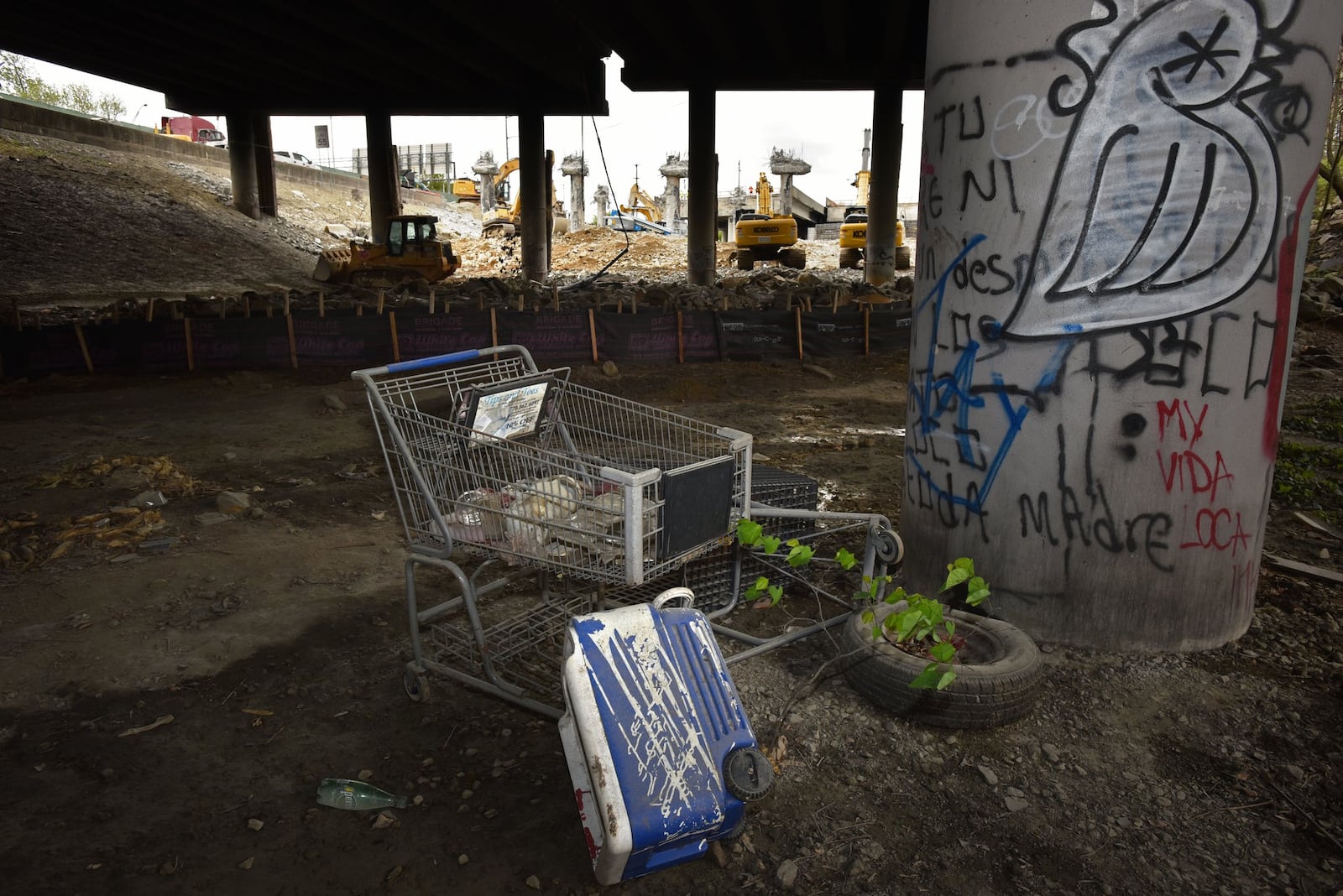 April 6, 2017 Atlanta - The remnants of homeless people litter the ground under I-85, near the sections that were damaged by a fire. HYOSUB SHIN / HSHIN@AJC.COM