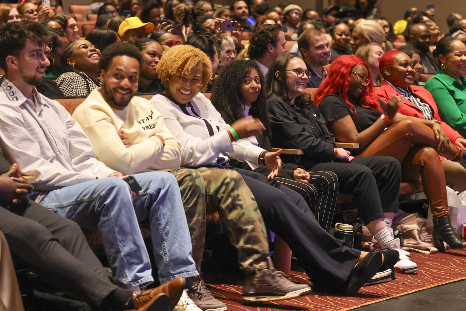 Georgia State College of Law students listen as rapper Rick Ross speaks at the conclusion of the Legal Life course by Professor Mo Ivory at The Rialto Theatre on Tuesday, Nov. 7, 2023. The Legal Life of Rick Ross course explores the entertainer’s contracts and legal deals. (Natrice Miller/ Natrice.miller@ajc.com)