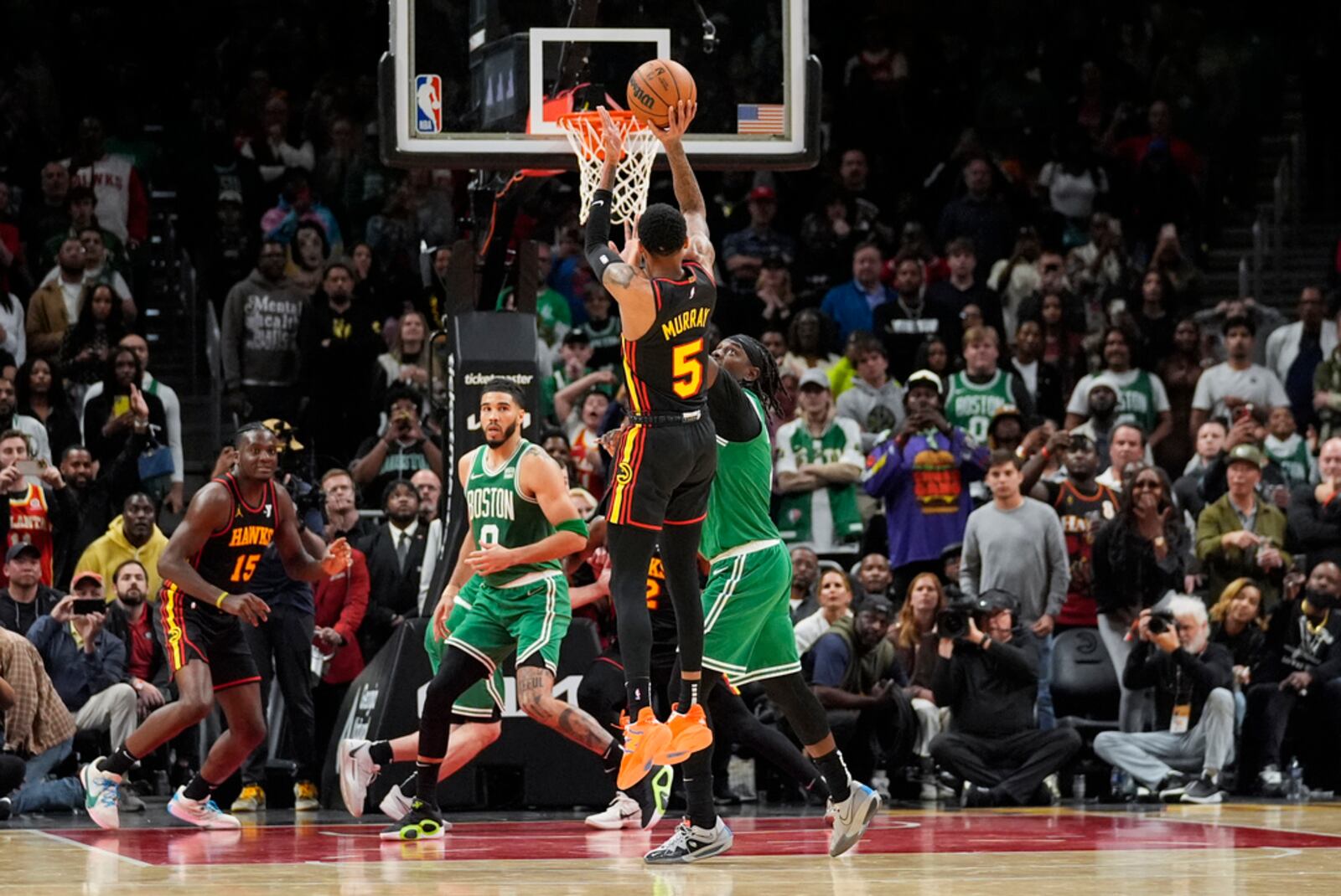 Hawks guard Dejounte Murray hits the game-winning shot in overtime.