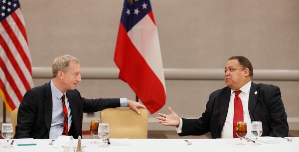 November 19, 2019 - Atlanta - Tom Steyer (left) talks with Atlanta Councilman Michael Julian Bond before the roundtable got underway.  Ahead of the Democratic Presidential Debate, candidate for the Democratic nomination Tom Steyer held a roundtable discussion and luncheon in Atlanta to talk with local African American leaders.  