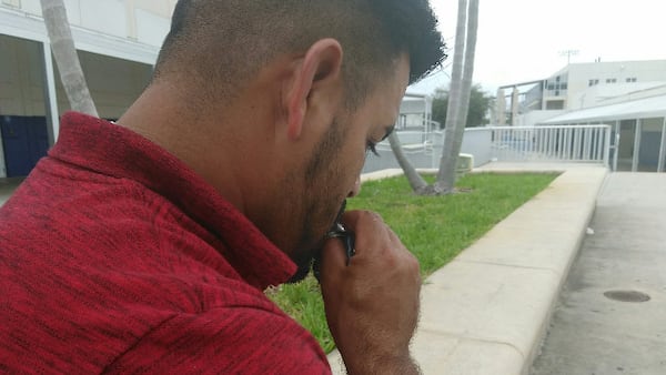 /Walter Villa Toro, an undocumented immigrant shared his story by not his face while taking shelter from Hurricane Irma at Forest Hill High School on Friday, September 8, 2017. (Julio Poletti/The Palm Beach Post)