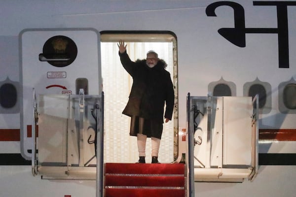 India's Prime Minister Narendra Modi waves from the stairs of his plane upon his arrival at Joint Base Andrews in Maryland on Wednesday.