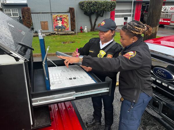 Terese Cummings (left) and Te'Quila Martin have nearly 30 years of shared firefighting experience.