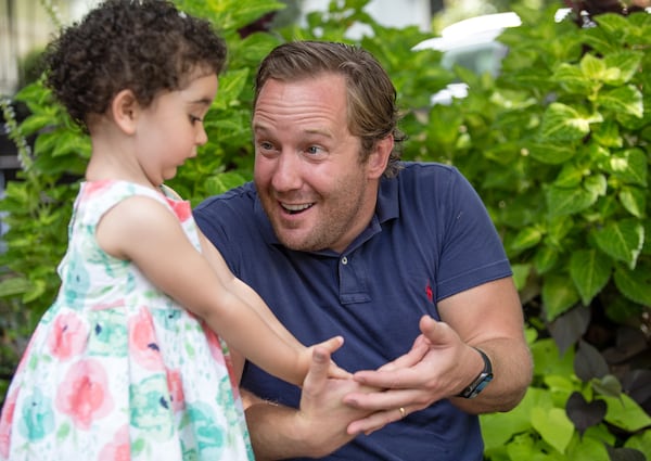 Derek Mize with his daughter, 2-year-old Simone Mize-Gregg on Friday, Sept 4, 2020.  (Jenni Girtman for The Atlanta Journal-Constitution)