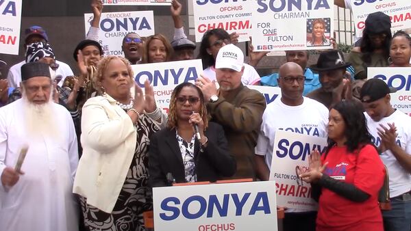 Sonya Russell-Ofchus (center) is running to chair the Fulton County Commission. (Screenshot from campaign video)