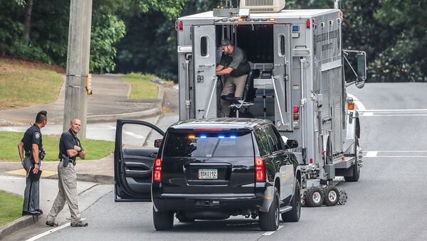 GBI bomb experts were called to investigate the suspicious package near the Johns Creek women's health clinic.