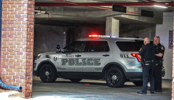 Dunwoody police on the scene of a recent homicide. (Photo: JOHN SPINK/JSPINK@AJC.COM)