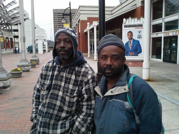 Lyndell Banks, left, and Carlos Garnett, right, are both homeless, and both say they worked for Atlanta City Councilwoman Cleta Winslow during last year's campaign. Both say they earned $5 per hour, which is less than minimum wage.