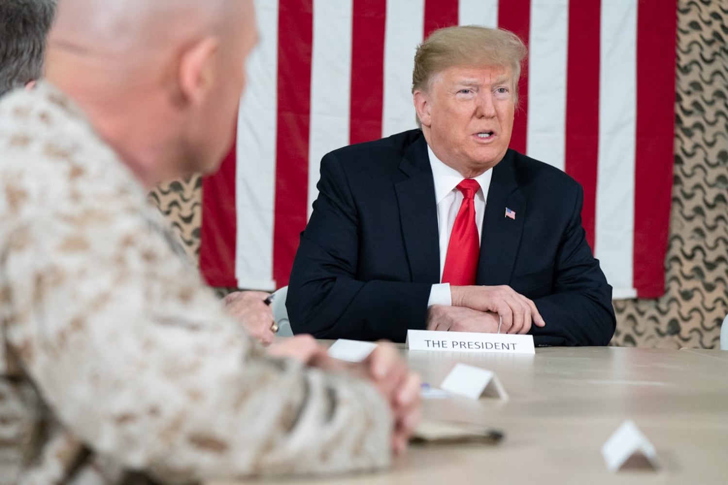 Trump makes unannounced visit to troops in Iraq