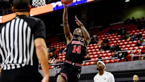 Bulldogs guard Tye Fagan (14) goes up for a shot against Sunday, Jan. 31, 2021, against the Tigers at the Auburn Arena, in Auburn, Ala. (Todd Van Emst/AU Athletics)