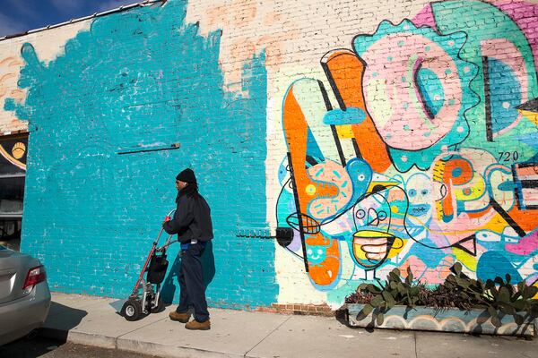 01/15/2019 -- Atlanta, Georgia -- A mural by Atlanta-based artist Ray Geier has been painted over with blue paint at HodgePodge Coffeehouse and Gallery in the East Atlanta community of Atlanta, Tuesday, January 15, 2019. (ALYSSA POINTER/ALYSSA.POINTER@AJC.COM)