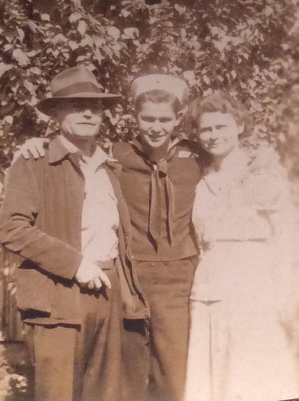 Johnny B. Floyd (from left), Johnny O. Floyd and Pearl Wright Floyd in 1945. Johnny B. Floyd befriended a German POW named Siegfried Pretscher, who created two paintings for him during the summer when Pretscher worked at a labor camp in Dublin, Ga. CONTRIBUTED BY GARY FLOYD