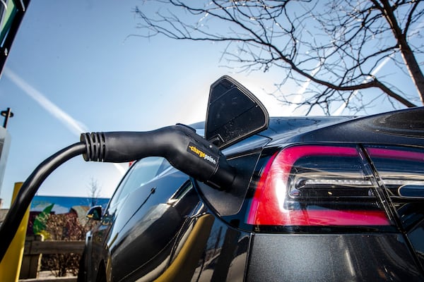 The Biden administration today will announce new domestic manufacturing standards for federally-funded electric vehicle chargers among other changes intended to expand the country’s network of charging stations. (Brittainy Newman/The New York Times)