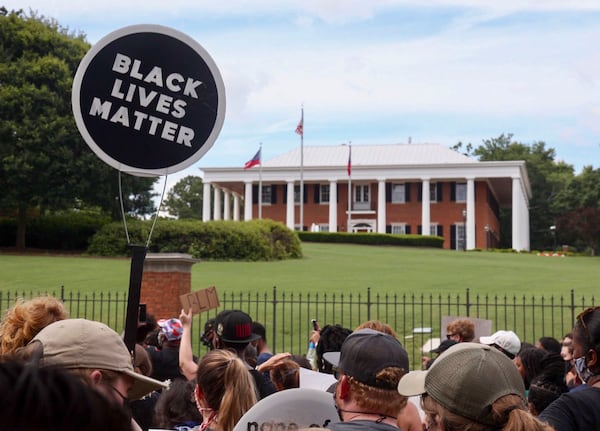 Demonstrators gathered at the Governor's Mansion on Sunday, June 7, 2020. (Photo: Steve Schaefer for The Atlanta Journal-Constitution)