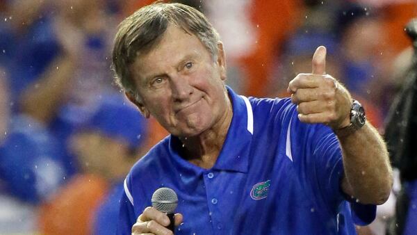 Former Florida player and head coach Steve Spurrier makes remarks after he was honored during a game against Massachusetts, Saturday, Sept. 3, 2016, in Gainesville, Fla.