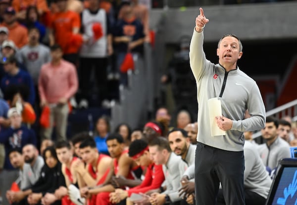 Georgia head coach Mike White reacts after a play during the first half an NCAA college basketball game against Auburn, Saturday, Feb. 22, 2025, in Auburn, Ala. (AP Photo/Julie Bennett)