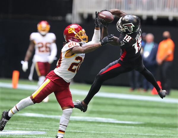 Washington Football Team safety Bobby McCain breaks up a pass to Falcons wide receiver Calvin Ridley during the fourth quarter Sunday, Oct. 3, 2021, at Mercedes-Benz Stadium in Atlanta. (Curtis Compton / Curtis.Compton@ajc.com)