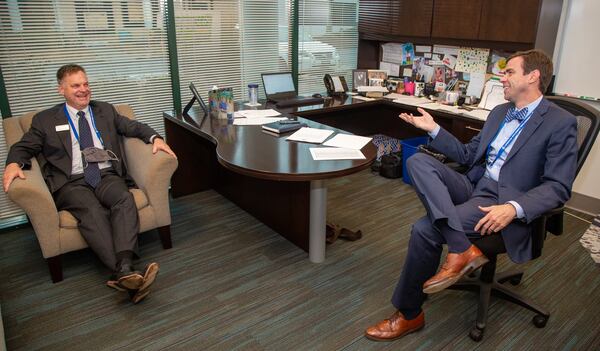 Middle School Principal Dr Kevin Jenkins (left) chats with Headmaster Colin Creel in his office at Cornerstone Christian Academy in Peachtree Corners on Monday January 25th, 2021 For a story on the Top Workplace small category. PHIL SKINNER FOR THE ATLANTA JOURNAL-CONSTITUTION.