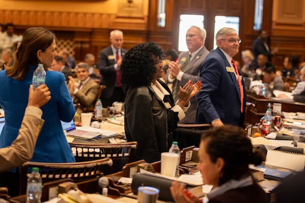 State representatives, including Rep. Viola Davis (center), D-Stone Mountain, at the House of Representatives at the Capitol in Atlanta on Crossover Day.