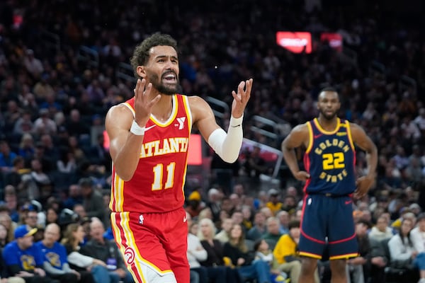 Atlanta Hawks guard Trae Young reacts during the first half of an NBA basketball game against the Golden State Warriors, Wednesday, Nov. 20, 2024, in San Francisco. (AP Photo/Godofredo A. Vásquez)