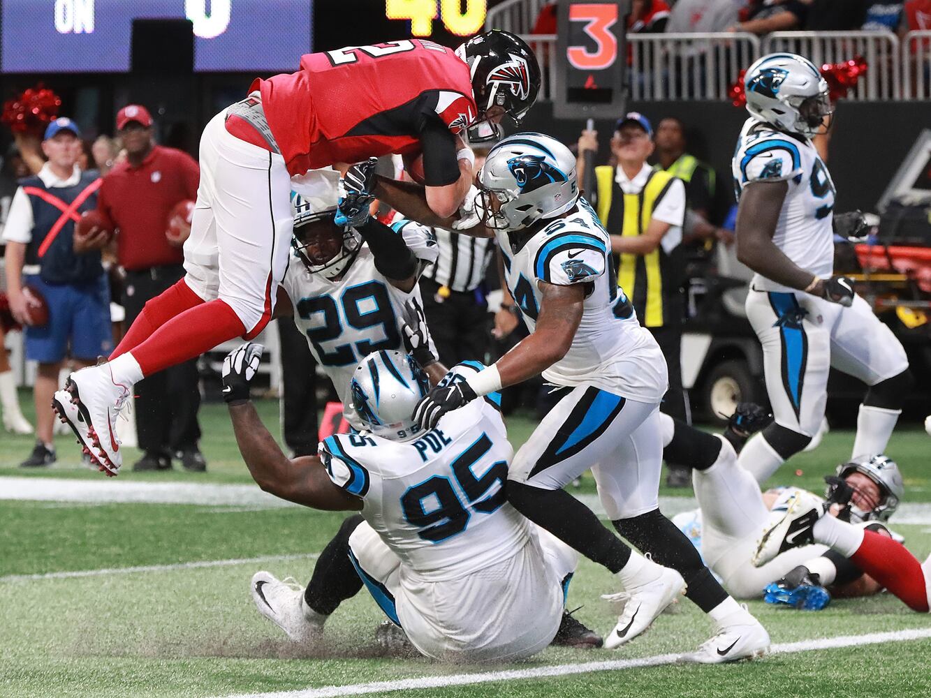 Photos: Falcons defeat Panthers, 31-24