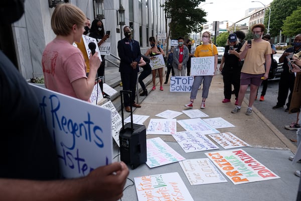 210427-Atlanta- Students gather in front of the University System of Georgia offices in Downtown Atlanta on Tuesday afternoon, April 27, 2021, to protest against former Gov. Sonny Perdue becoming the new chancellor. Ben Gray for the Atlanta Journal-Constitution