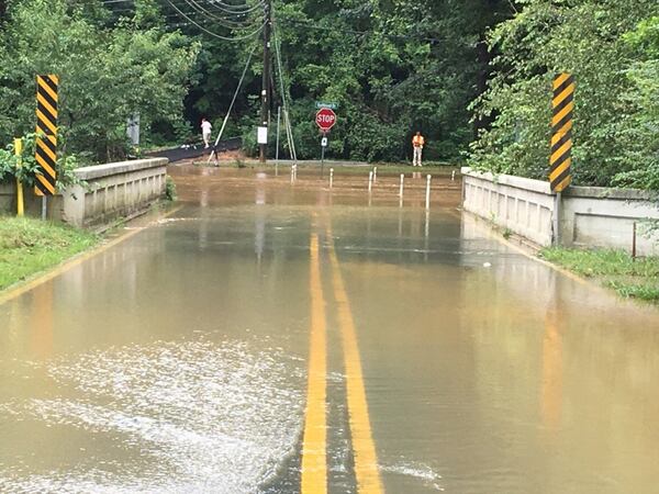 Windsor Parkway at Northland Drive was flooded at one point Wednesday, Sandy Springs police said. It has since reopened. (Credit: Sandy Springs Police Department)