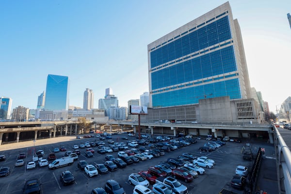 The parking lot known as the Gulch, primarily utilized by federal employees of the Richard B. Russell Federal Building and the Sam Nunn Atlanta Federal Center, began to reach capacity on Monday, February 24, 2025. This date marked the first full return-to-office day for many federal workers in downtown Atlanta. (Miguel Martinez/ AJC)