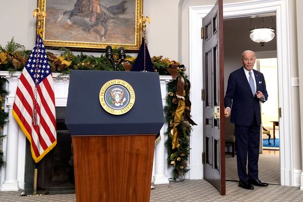 President Joe Biden responds to a question from a reporter as he departs after speaking about the sudden collapse of the Syrian government under Bashar Assad from the Roosevelt Room at the White House in Washington, Sunday, Dec. 8, 2024. (AP Photo/Manuel Balce Ceneta)