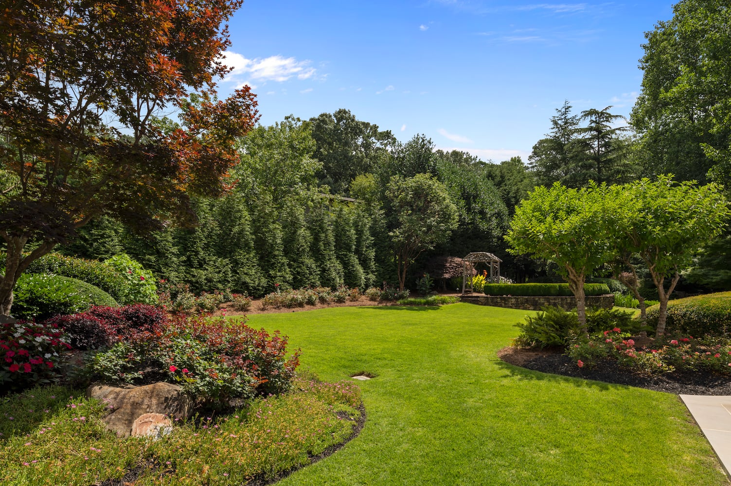 Over 1.5 acres of lush landscapes bring the low country to East Cobb